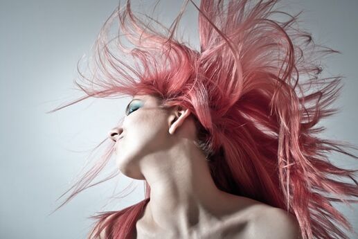woman with hair dyed pink